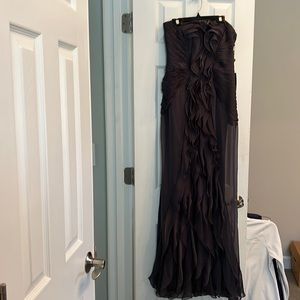 I would describe this dress as the color Smokey amethyst. Never worn. Gorgeous.